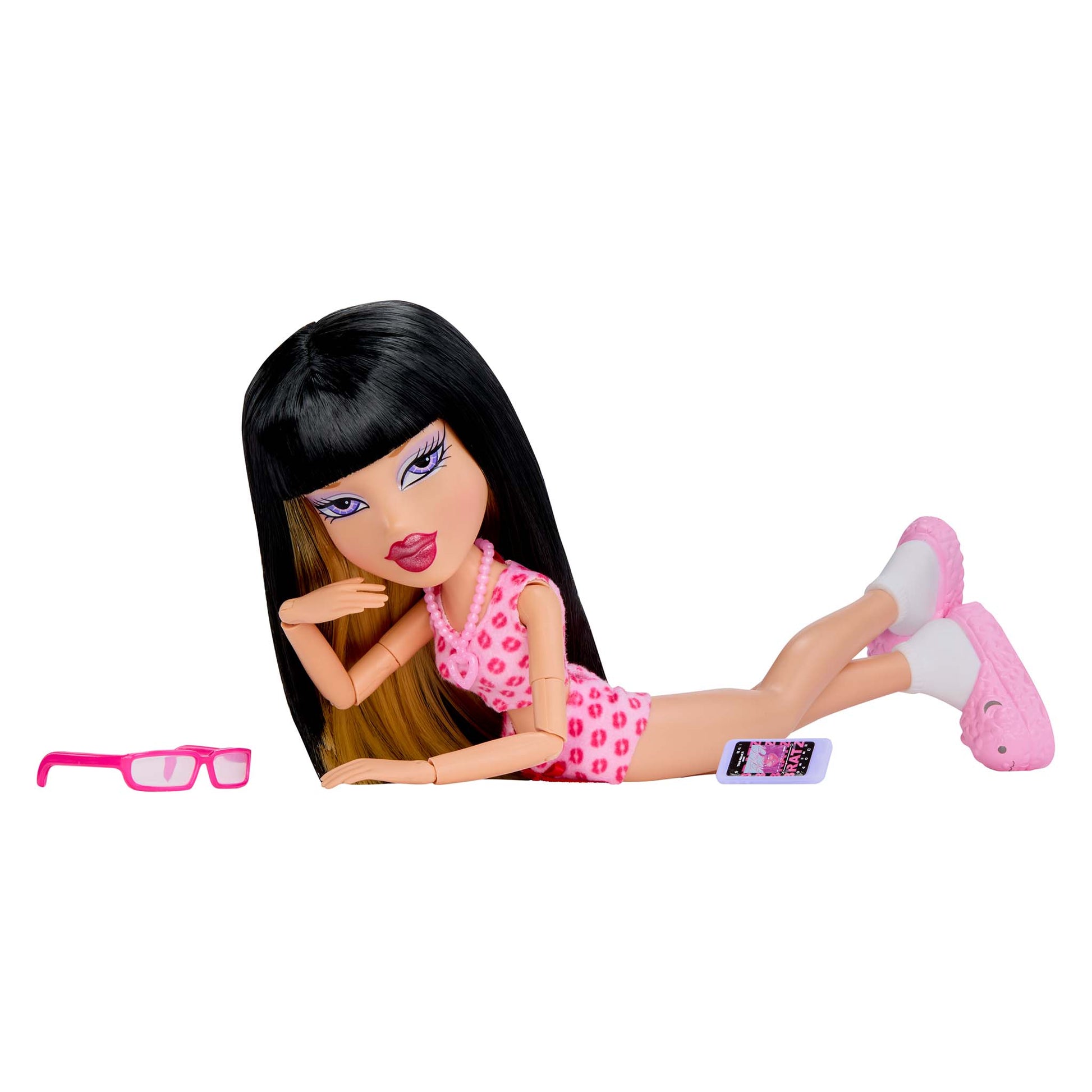 doll laying with glasses and phone