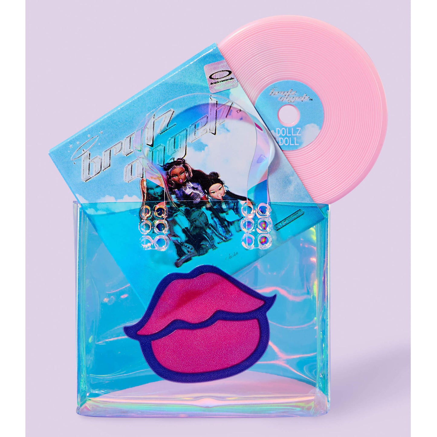 Pink mini record with sleeve in a clear vinyl bag with Pink lips on a purple background. 