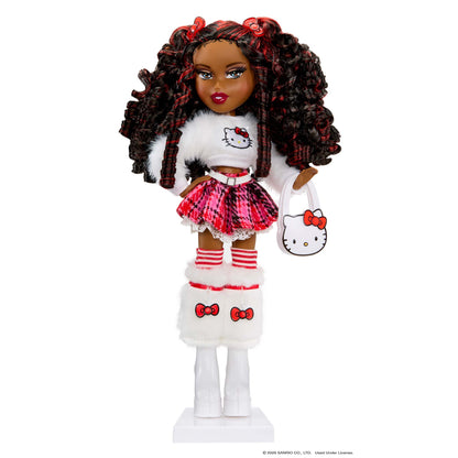 A fashion doll with dark curly hair styled in red and black plaid, wearing a white and red Hello Kitty outfit with a matching handbag, standing on a white display base against a white background.