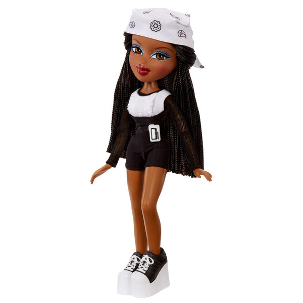 Doll with black hair, white cap, black outfit, and white sneakers 