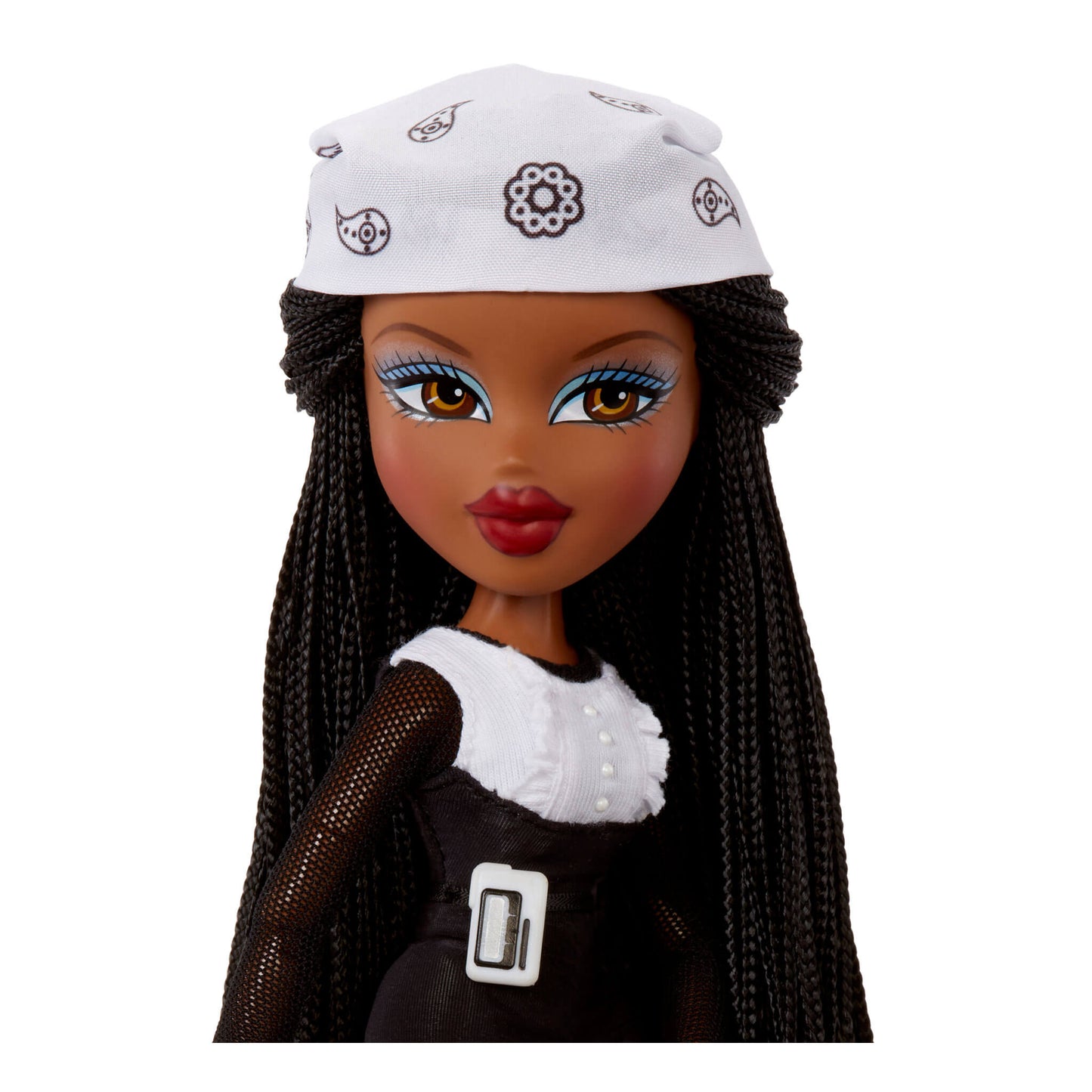 Doll with braided hair wearing a white cap and black outfit