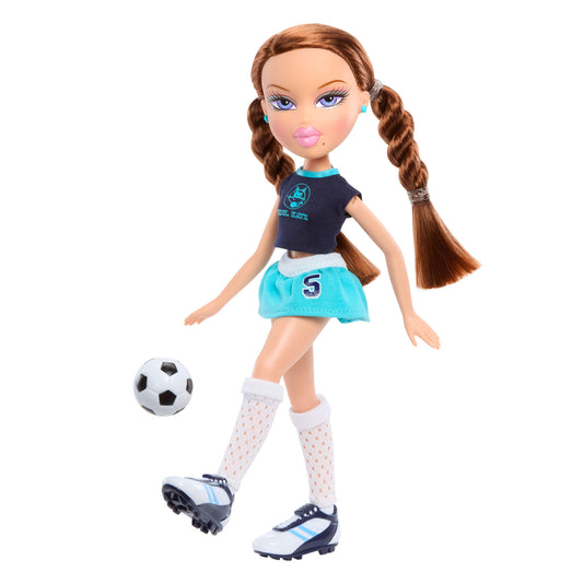 Roxxi kicking soccer ball