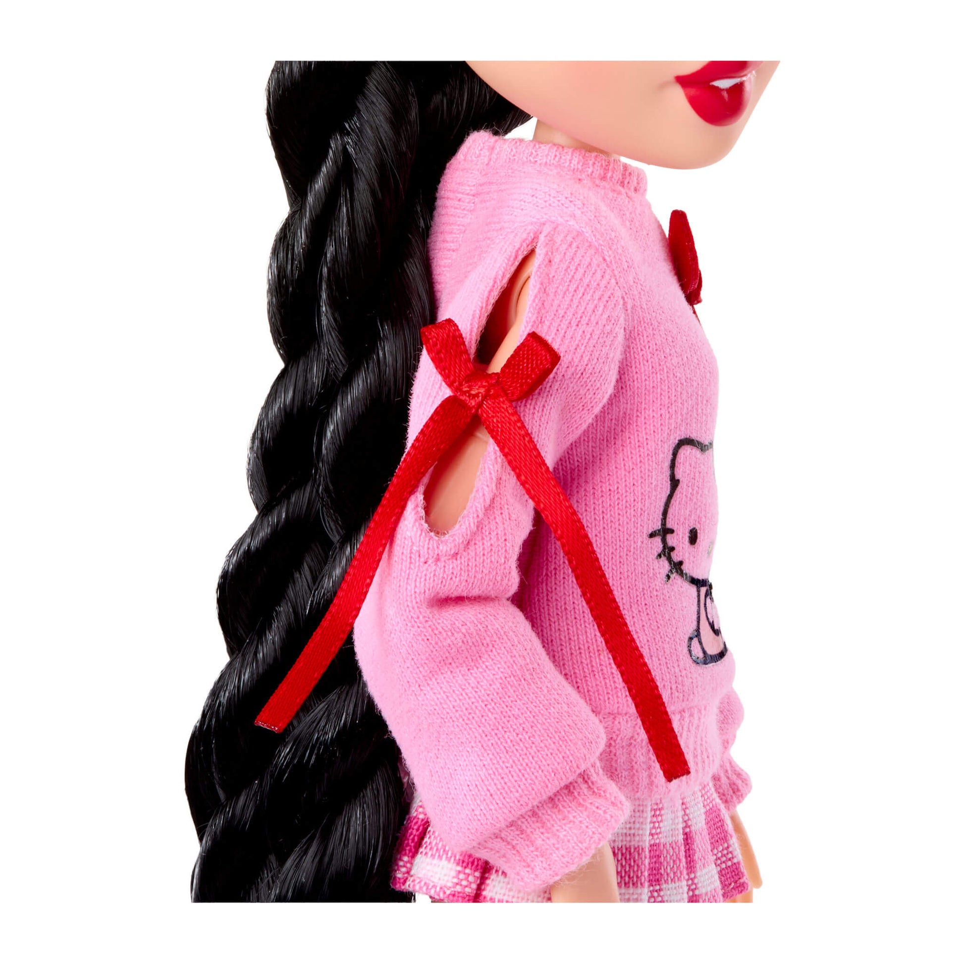 Side view of sweater with red ribbon 