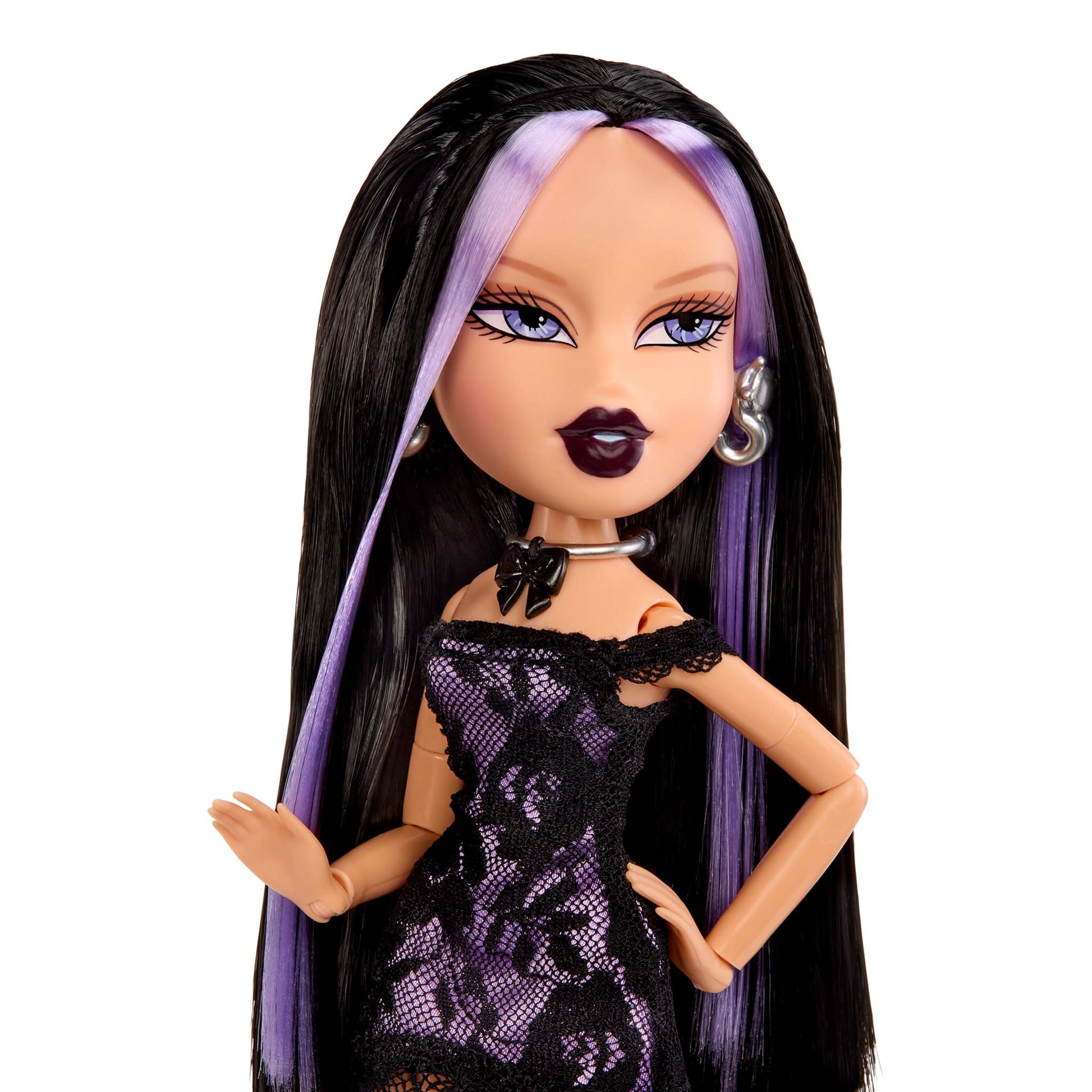 Doll up-close with long black and purple hair wearing a black dress
