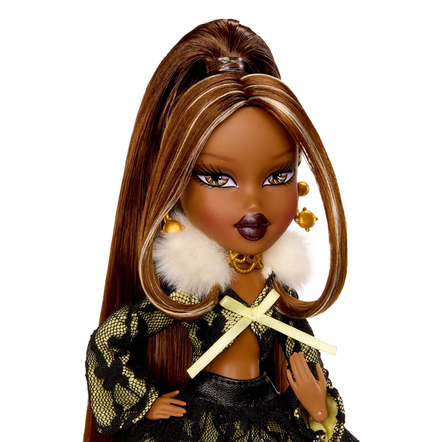 Doll with long brown hair and stylish outfit upclose