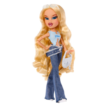 Cloe fashion doll with long blonde hair, wearing a light blue top, blue jeans, and holding a white handbag