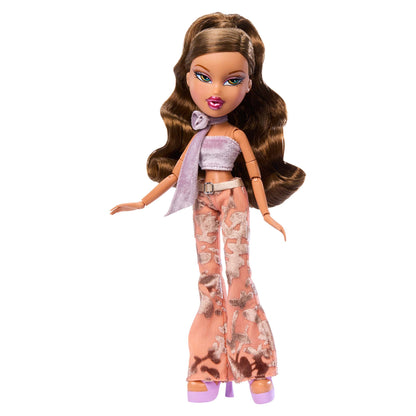 Yasmin Bratz doll with long brown hair, wearing a lavender crop top, a matching purple scarf, and patterned peach pants with purple heels