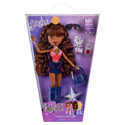 Bratz Sasha first reimagined doll in its front packaging, featuring long brown curly hair, a pink and blue outfit, blue thigh-high boots, sunglasses, and a blue purse.