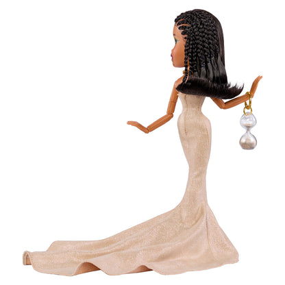 bratz x tyla doll with back train of gold gown with bag