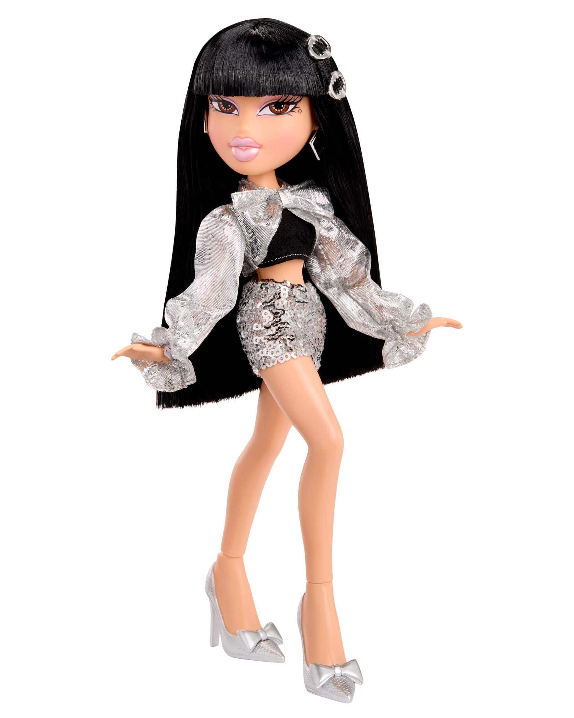 Doll with long black hair, black and silver top, silver sequin shorts, and high heels on a white background