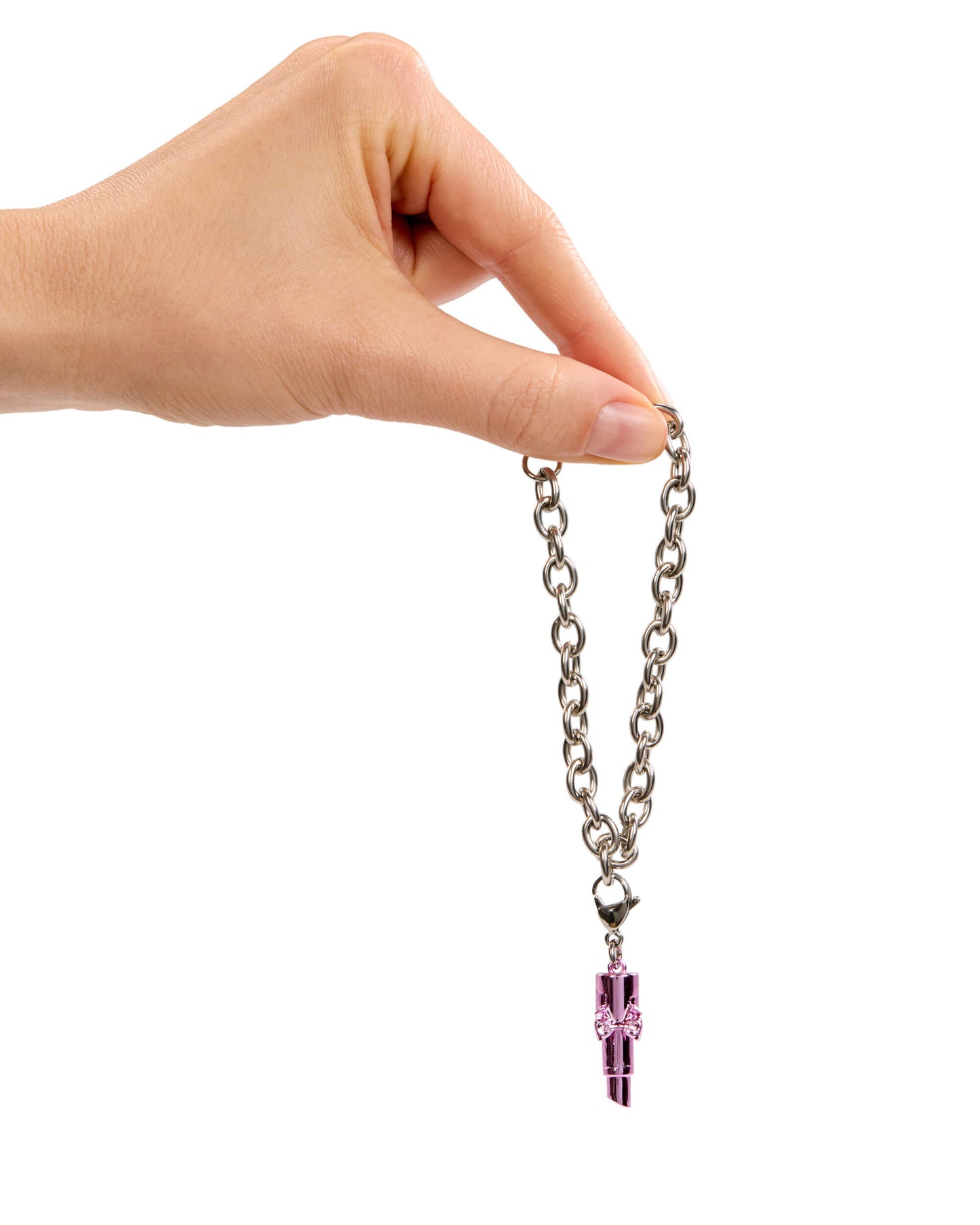 Hand holding a chain with a pink charm against a white background