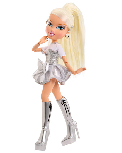 Doll with blonde hair, white top, and silver skirt on a white background