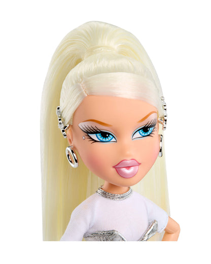 Toy doll with blonde hair and blue eyes on a white background