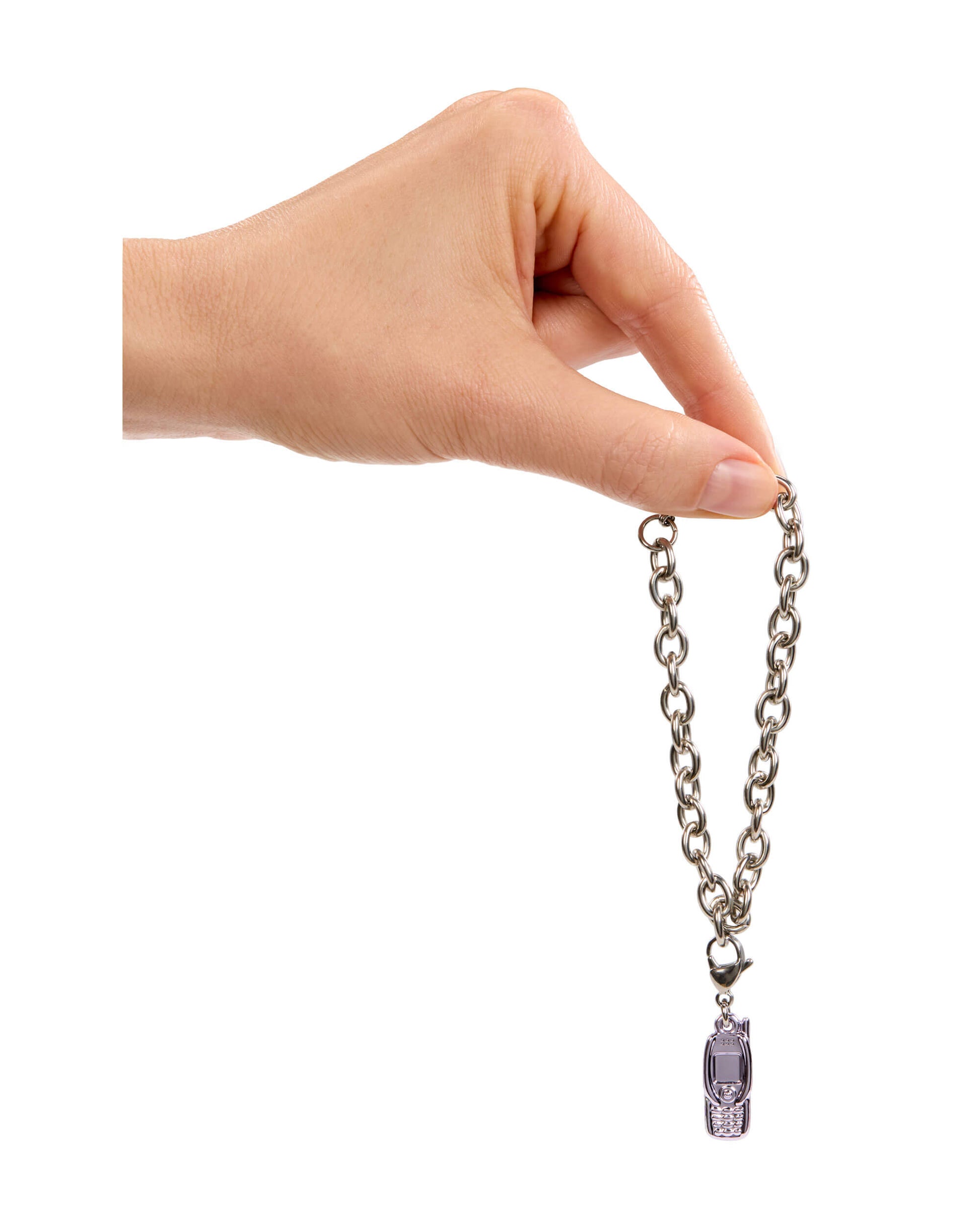 Hand holding a chain with a purple charm against a white background