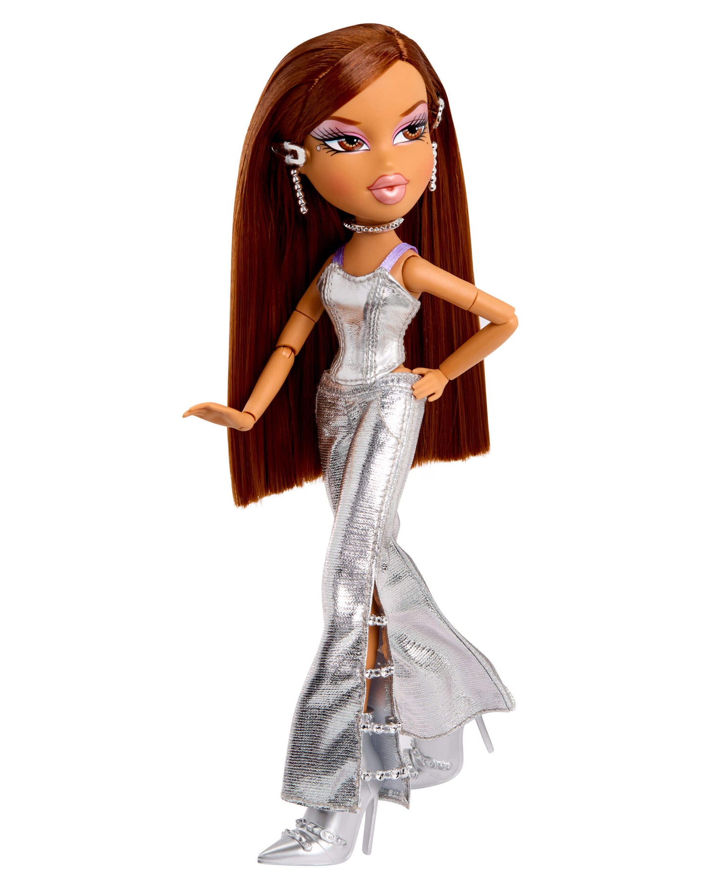 Doll with long brown hair wearing a silver dress on a white background