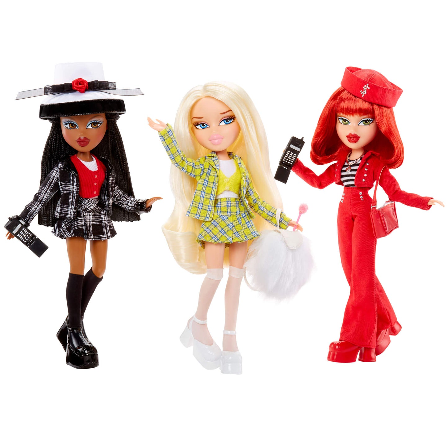 Three dolls with distinct outfits on a white background