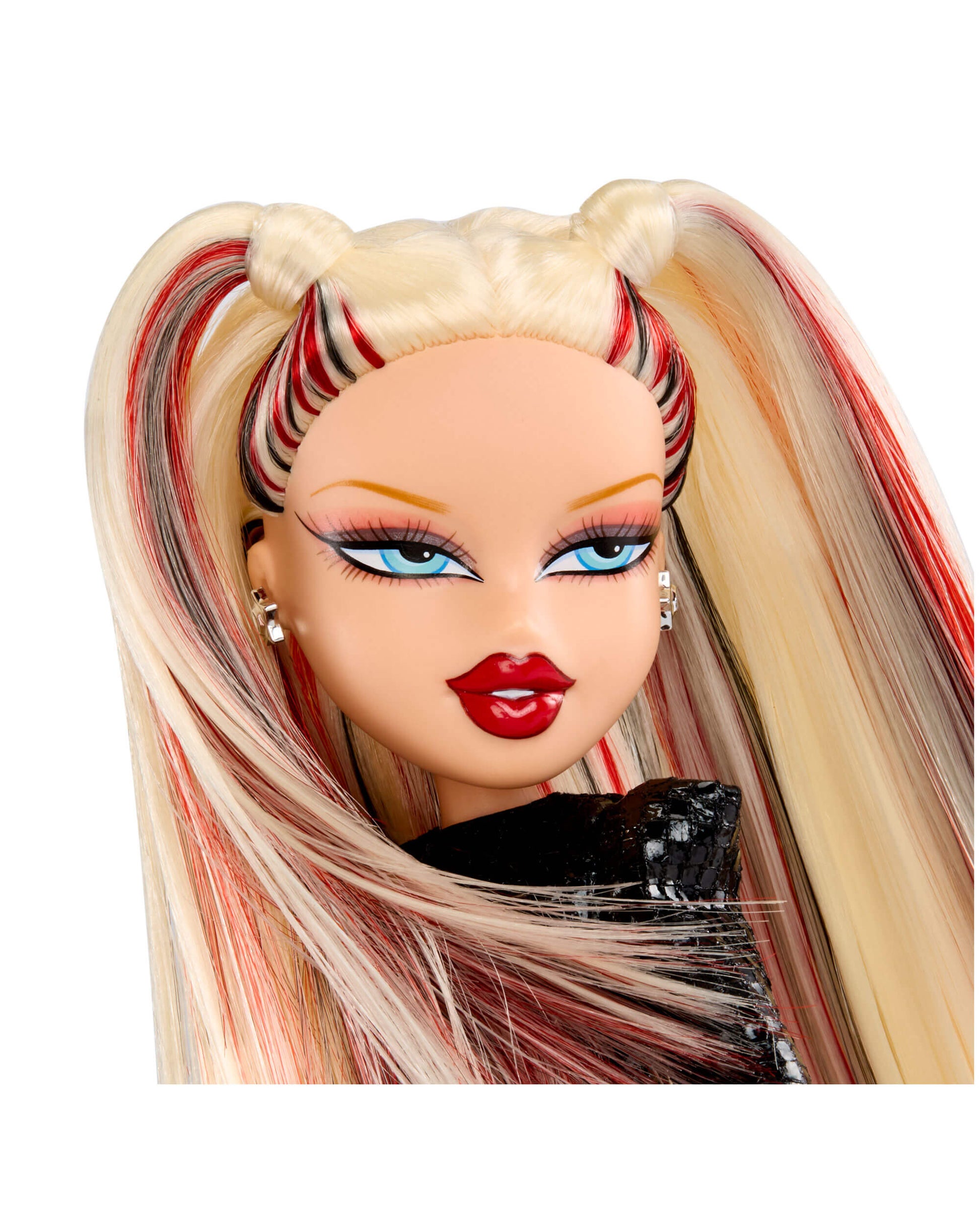 Close-up of a doll with blonde hair and red accents on a white background